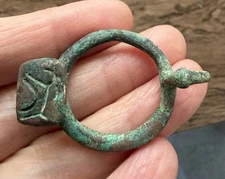 BRONZE AGE NEAR EASTERN (CIRCA 1000-800 B.C). BRONZE HORSE OR CHARIOT FITTING.