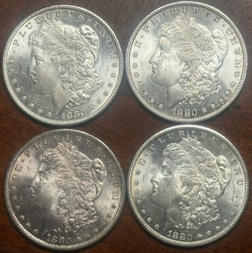 Lot of #4  1880-S   Uncirculated Silver Morgan Dollars. Winner gets all four.