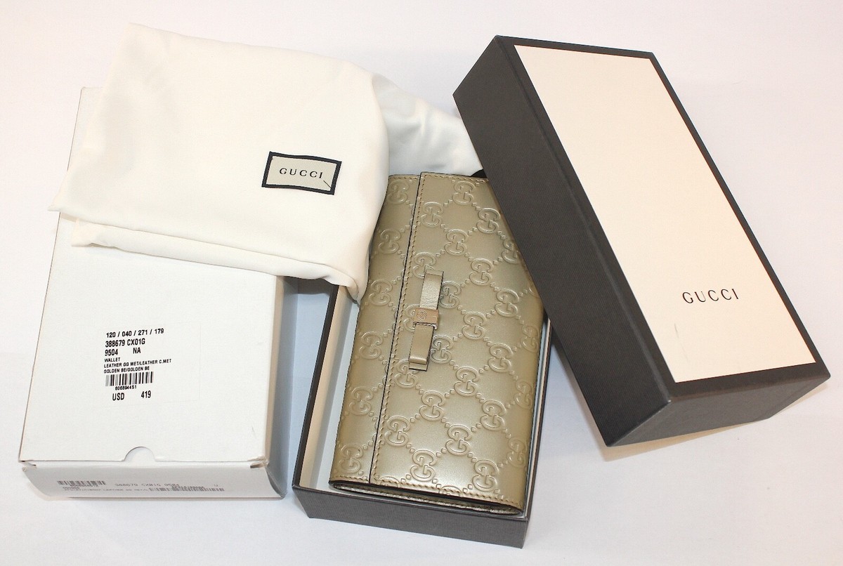 Gucci GG Signature Bow Continental Wallet • Golden Metallic  display picture 1