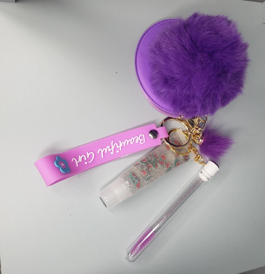 10 llaveros de brillo de labios al por mayor Foto 2 de 4