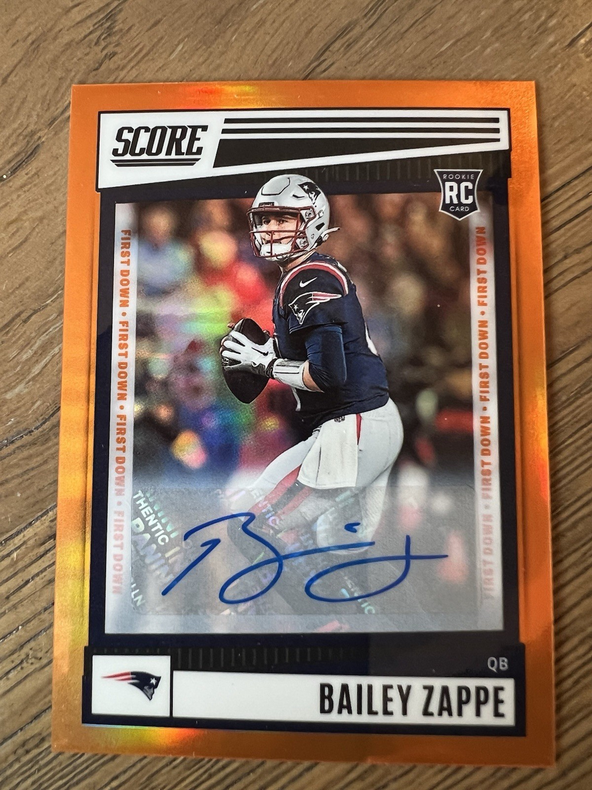 2022 Panini Chronicles Score Bailey Zappe Orange /10 RC