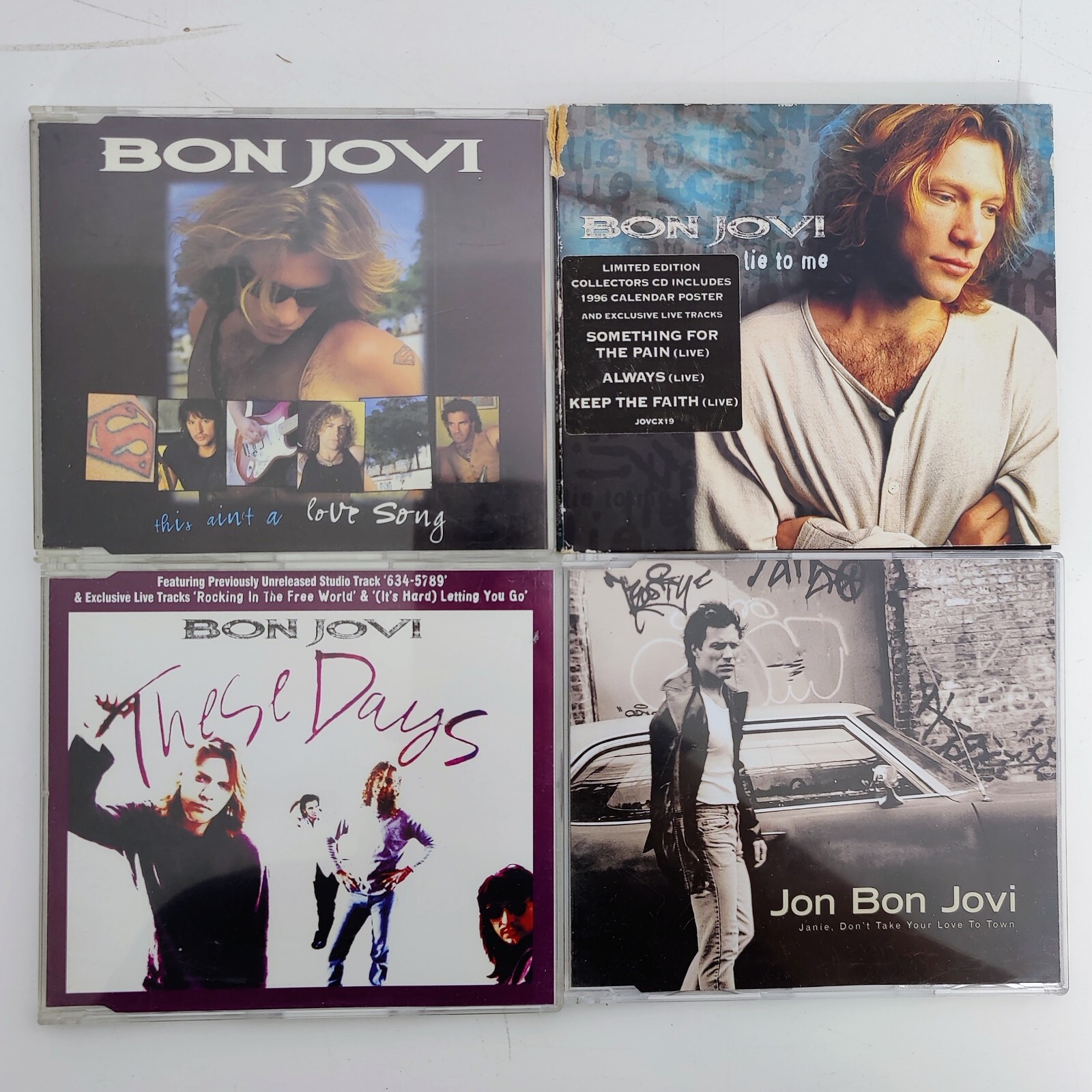 4x Bon Jovi CD Singles. These Days, Lie to Me, Janie, This Ain't a Love Song