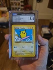Pokémon TCG Surfing Pikachu Black Star Promo 28 CGC 8.5 Pokémon League 2001