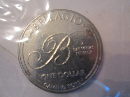 7 VINTAGE METAL CASINO SPIELCHIPS - EIN DOLLAR - CAESARS & BELLAGIO - Bild 4 von 8