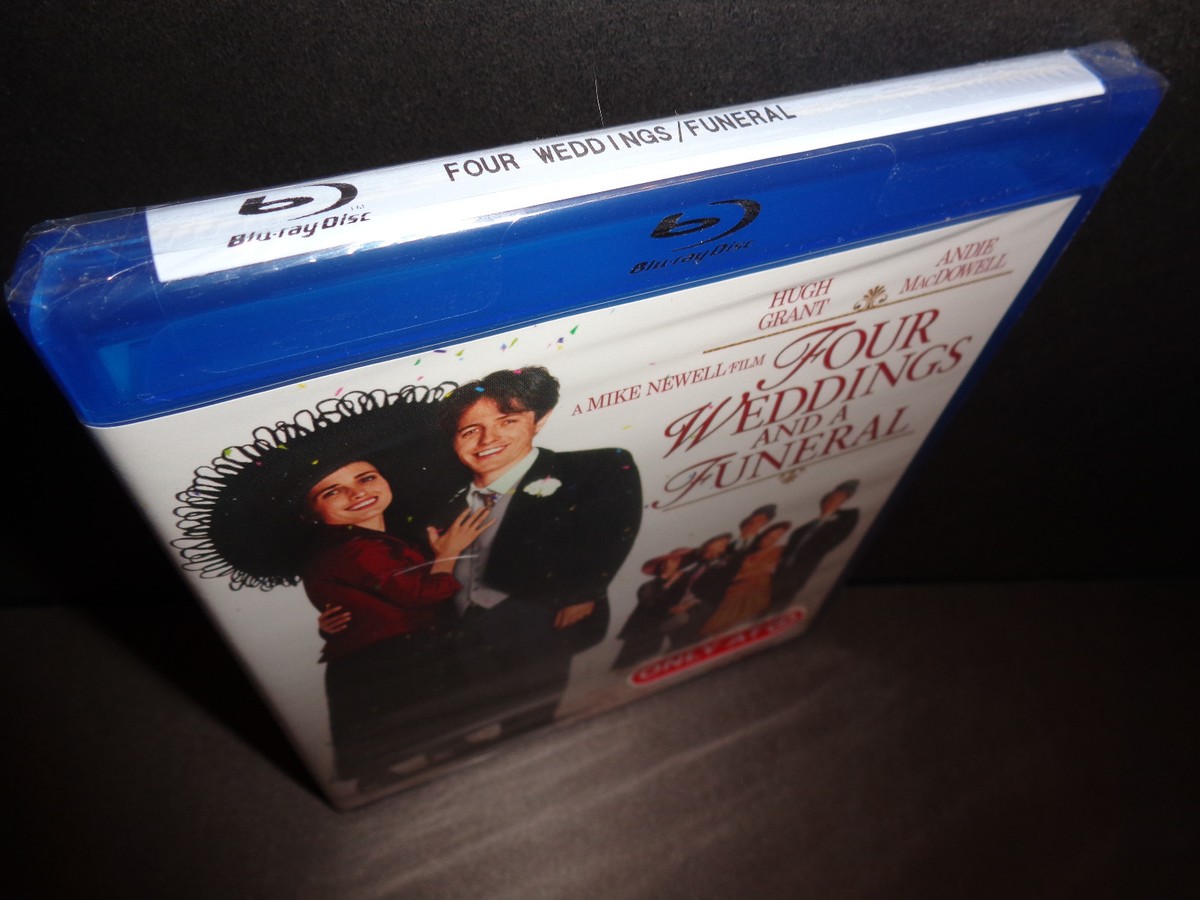 FOUR WEDDINGS AND A FUNERAL-Hugh Grant & Andie MacDowell keep
