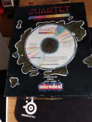 boxedCOMMODORE AMIGA A500-A2000 ''QUARTET'' Computer MUSIKSOFTWARE microdeal sehr guter Zustand