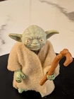 Vintage 1980 Kenner Star Wars Empire Strikes Back Yoda 3.75" action figure.