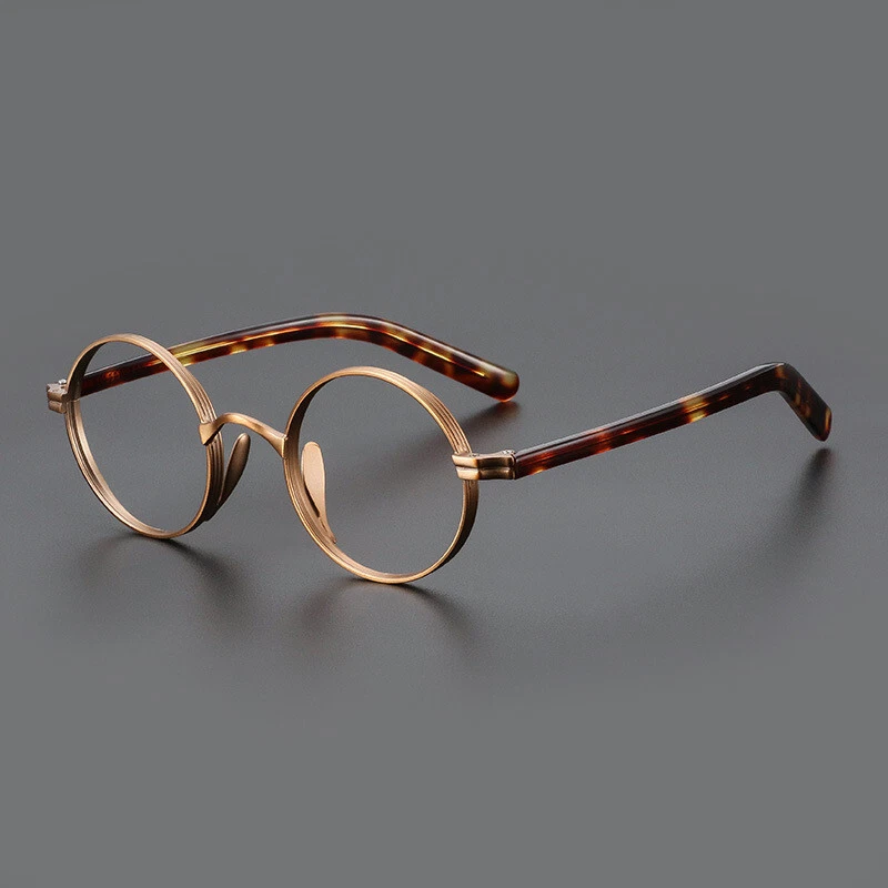 Gafas de titanio redondas retro para mujeres y hombres monturas de gafas de acetato Foto 2 de 4