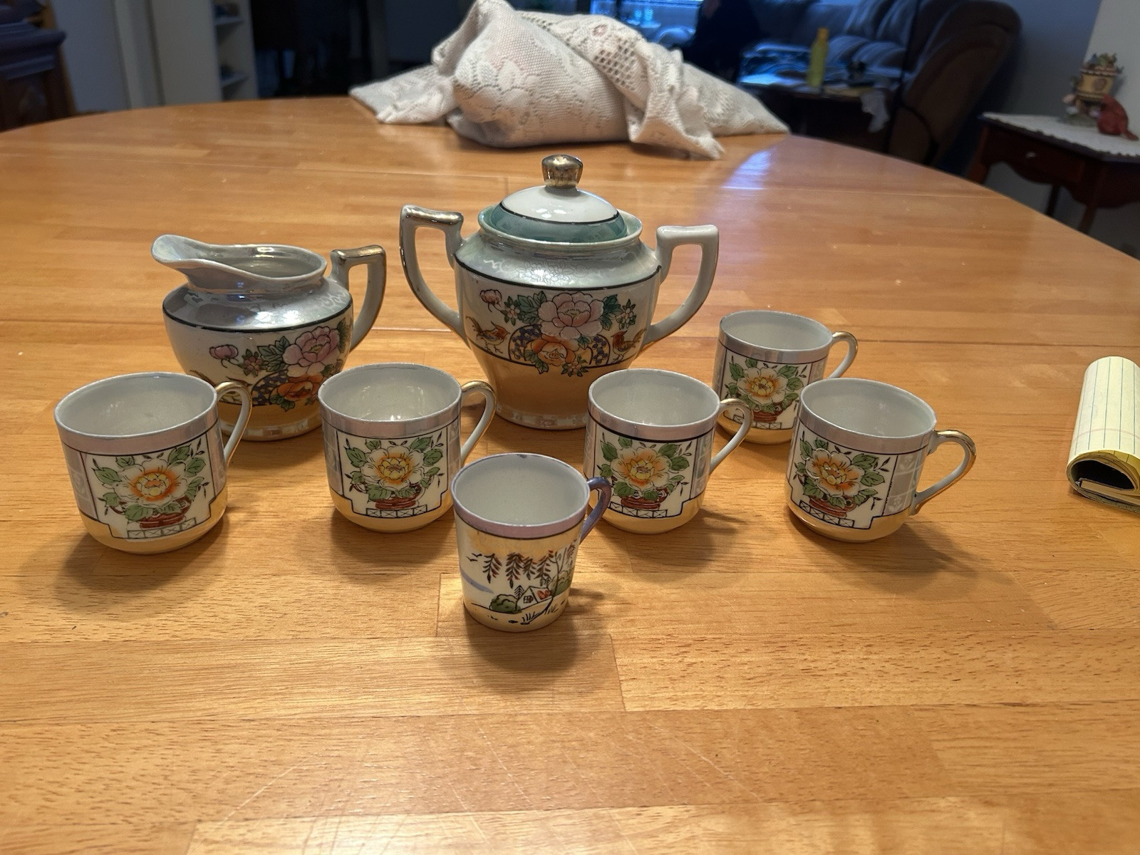 Vintage Japanese porcelain tea set with floral design  