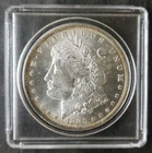 1885 O $1 Morgan Silver Dollar in a Plastic Holder