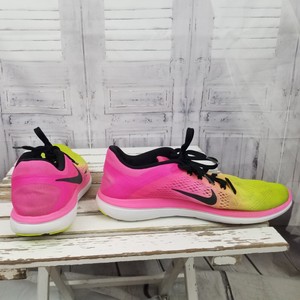 nike running shoes pink and yellow