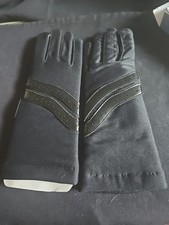 Vintage Sheer Energy Knit Lined Driving Gloves still in box. Black in color.