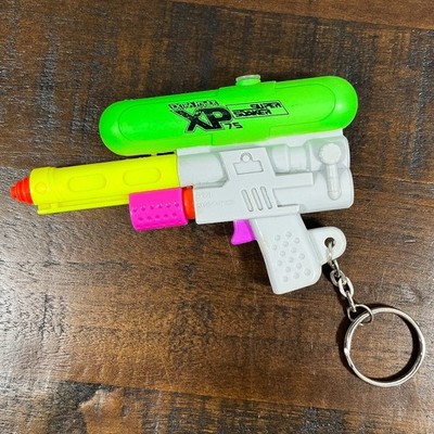 Vintage 1990s Super Soaker XP 75 Mini Water Squirt Gun Toy Plastic Keychain