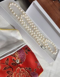 WHITE 7MM PEARL NECKLACE 24" LONG W, SILVER CLASP GSV PAT. NO. GREAT CONDITION.