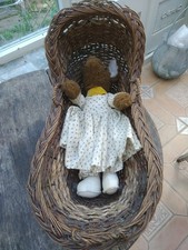 Vintage Dressed Baby Fox in a  Wicker Rocking Crib