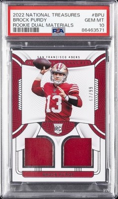 2022 NATIONAL TREASURES ROOKIE DUAL MATERIALS #BPU BROCK PURDY 67/99 PSA 10
