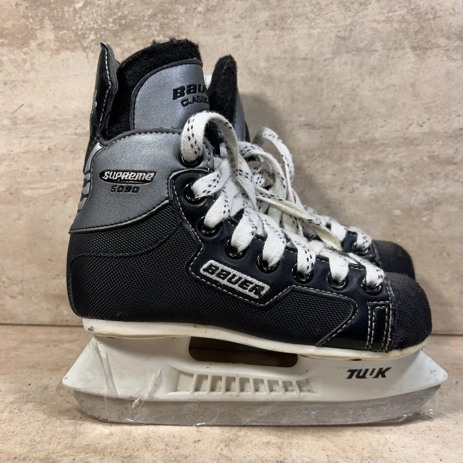 Patins de hockey sur glace junior Bauer Supreme 5090 taille USY 12 D chaussure classique USY 13