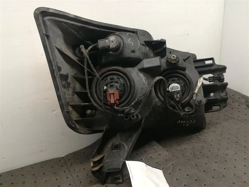 Conjunto de faros delanteros izquierdo Nissan Armada 2008-2015 OEM Foto 3 de 4