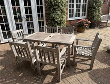 Barlow Tyrie solid teak garden tables and 6 carver chairs