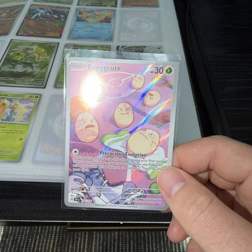 Exeggcute 192/191 Sv08: Surging Sparks Holo