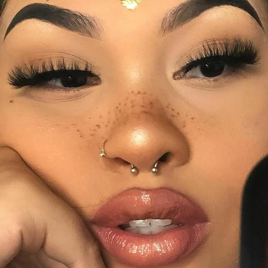 Septum ring in nose hotsell piercing