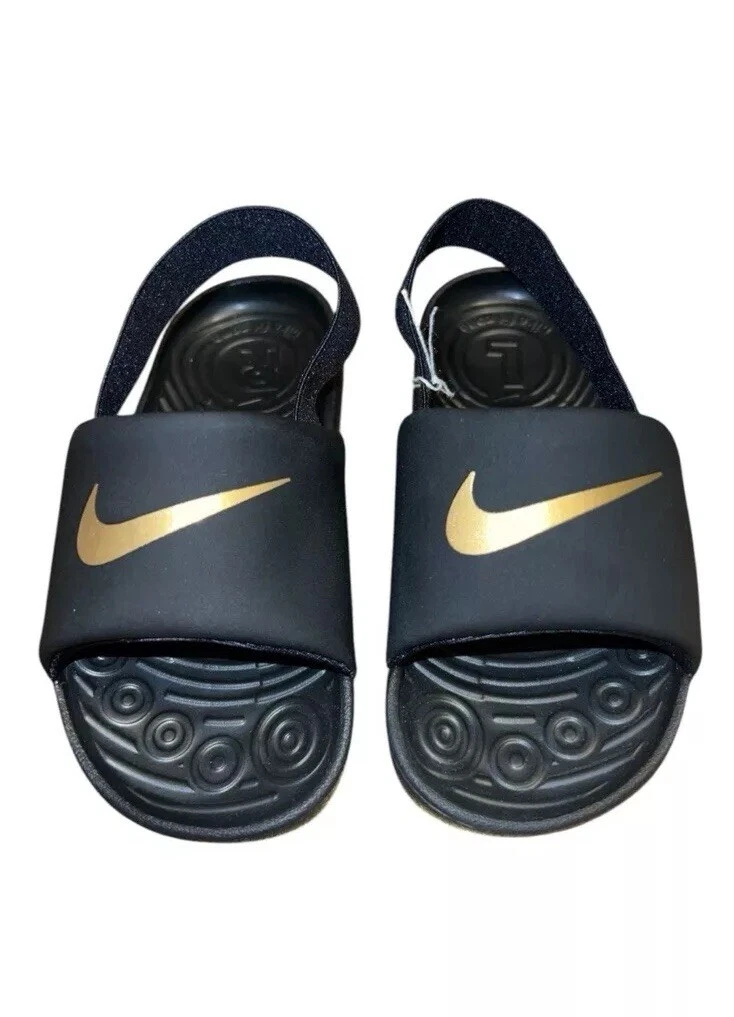 Nike Kawa Slides con cinturino sul tallone nero e oro bambino taglia 10C NUOVO