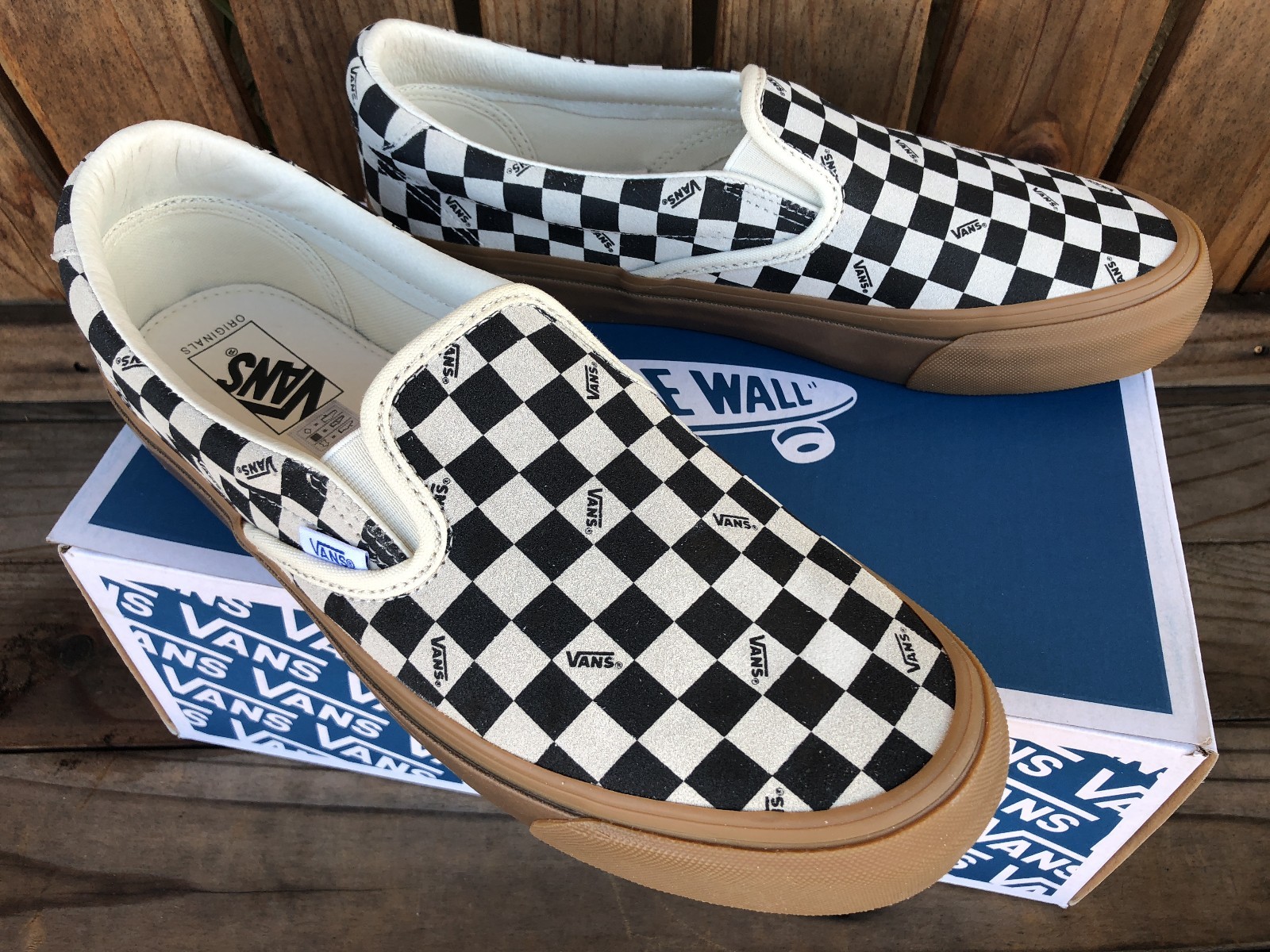 harga vans slip on checkerboard