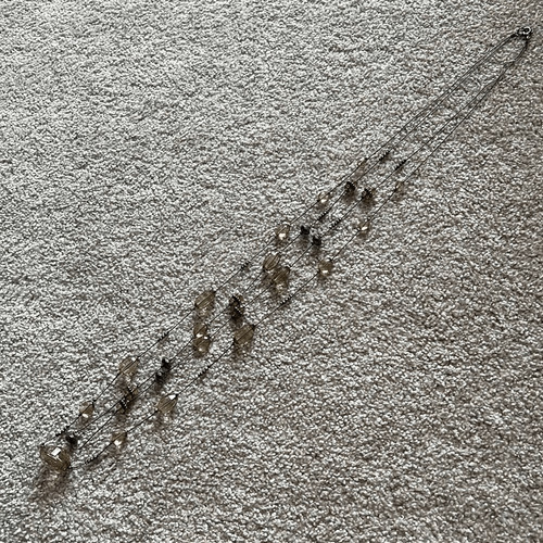 Double strand gunmetal and champagne beaded long necklace