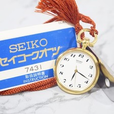 Near Mint Vintage 1986 Seiko Pocket Watch 7431-6010 Gold Round Quartz New Batt