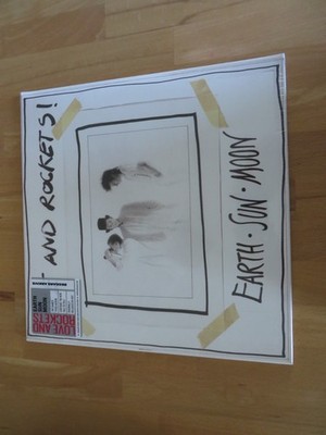 LOVE AND ROCKETS vinyl aus Sammlung EARTH SUN MOON in Folie