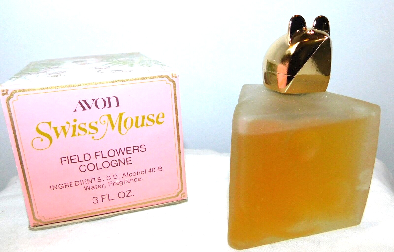 VTG AVON Swiss Mouse Field of Flowers Cologne Decanter  3 oz almost full w/Box