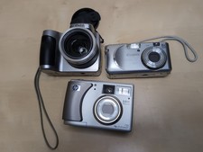 Lot of three Digital Cameras, Canon A460, HP 735, And Kodak Z740  For Parts