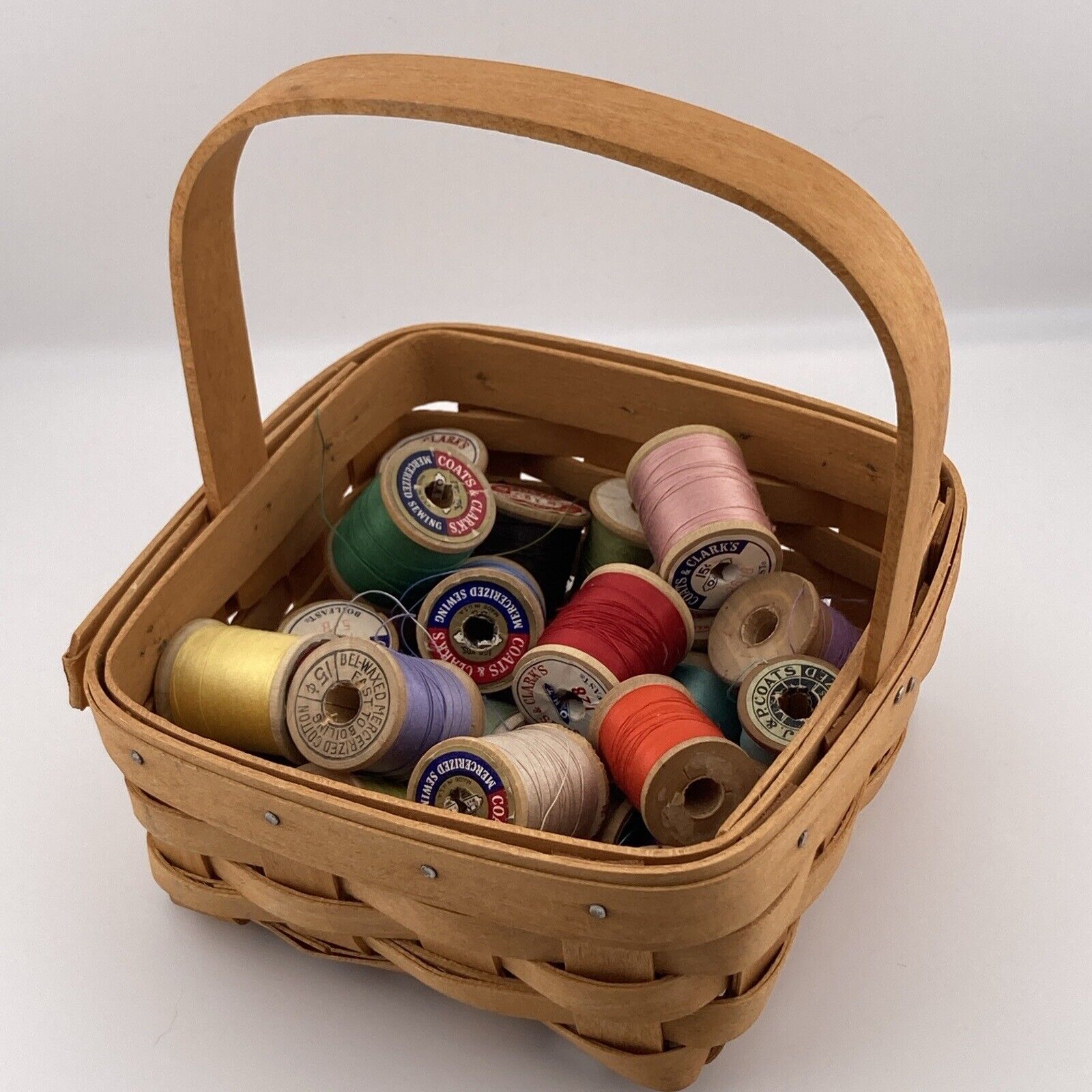 Two Dozen Vintage Wooden Spools of Silk and Cotton Thread Longaberger Basket
