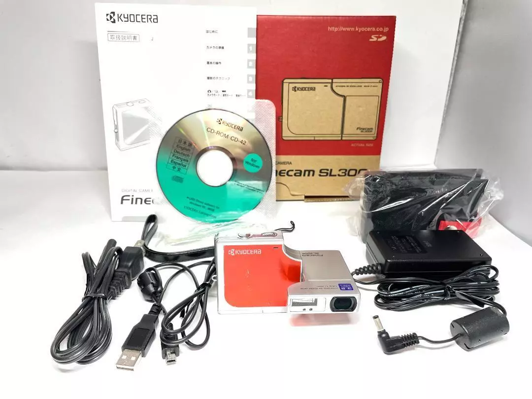 KYOCERA Finecam SL300R digital camera with accessories used silver