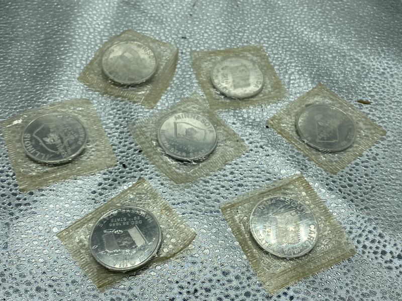 Roger Williams Mint Set of 7 State Coins, All Sealed. MO, SC, IA, IL, KS, NV, MN