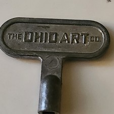 ONE Vintage Ohio Art Company Wind Up Metal Key