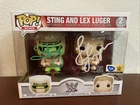 FUNKO POP WWE 2 PACK SIGNED BY STING AND LEX LUGER WITH COA