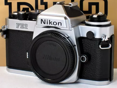 ** NEW UNUSED ** Nikon FE2 35mm SLR Silver Camera W/ Titanium Shutter #2357