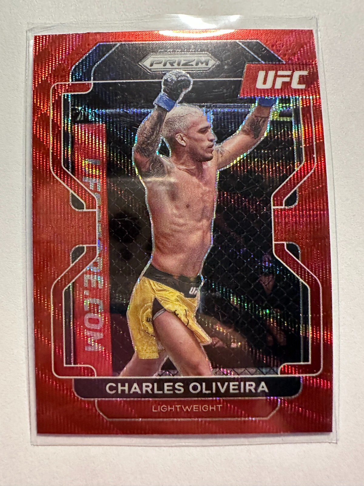 K28,779 - 2022 Panini Prizm UFC Prizms Ruby Wave #189 Charles Oliveira