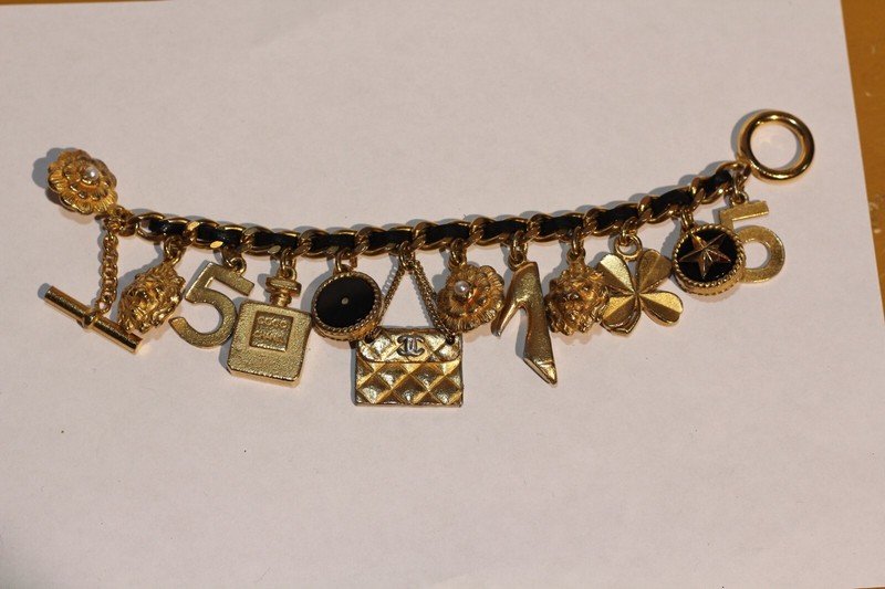 Chanel 1995 icon 12 charms gold chain with leather center bracelet