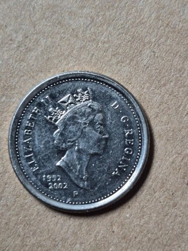 2002 Canada 10 Cents — photo from the most recent tracked eBay sale