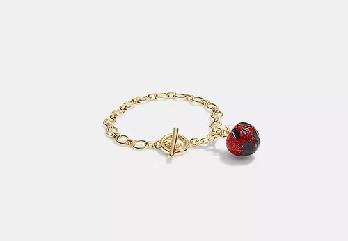 PULSERA MANZANA VENENOSA DISNEY X COACH - Imagen 2 de 2