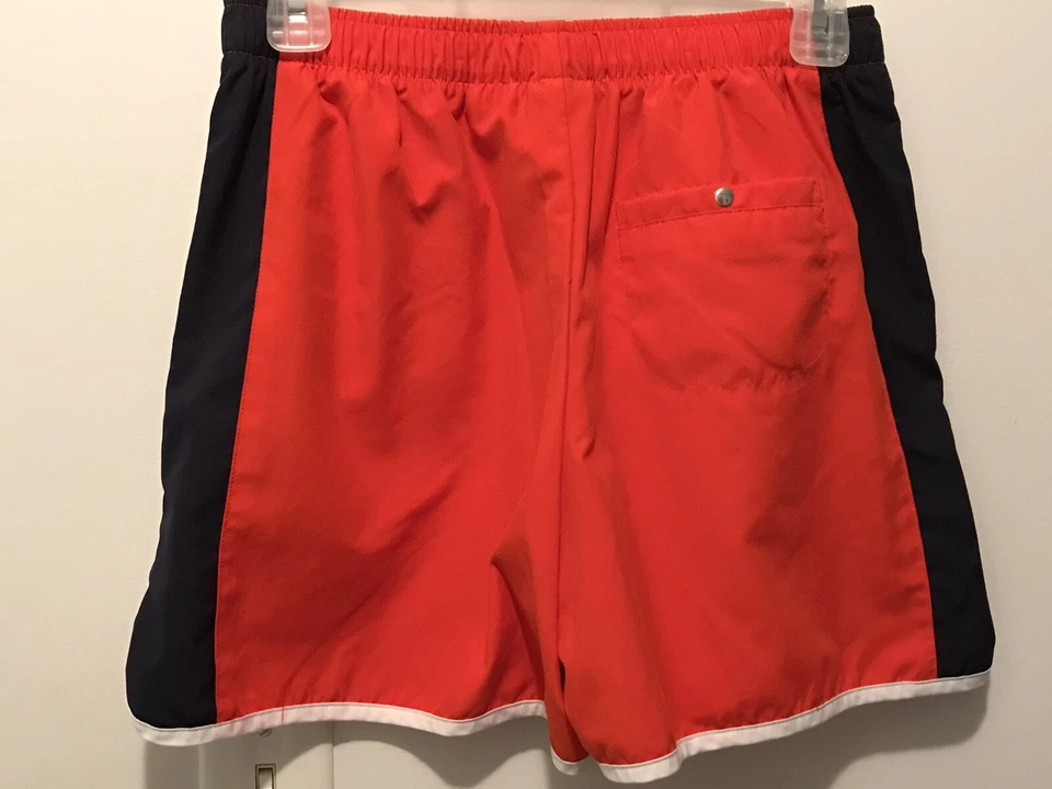 Pantalones cortos para correr Nike naranja y blanco para mujer talla pequeña 4-6 Foto 3 de 4