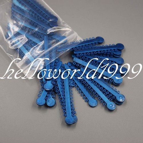 45 sacs attaches ligature orthodontique dentaire bandes élastiques en caoutchouc 45 couleurs 1040 pièces - Photo 8/12