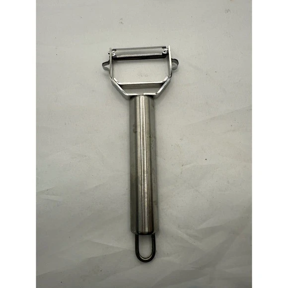 Utensilio de cocina pelador de cuchillas giratorias de acero inoxidable Titan 2 Foto 2 de 4