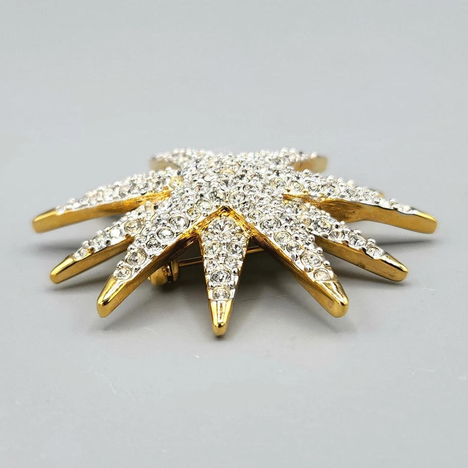 Broche estrella 12 puntos pavé cristal chapado en oro firmado Swarovski Swan Foto 4 de 4