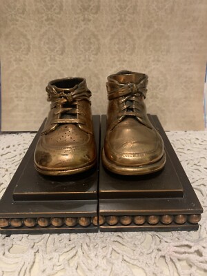 Set of vintage brass copper bronze coated infant baby shoe book ends  keepsake
