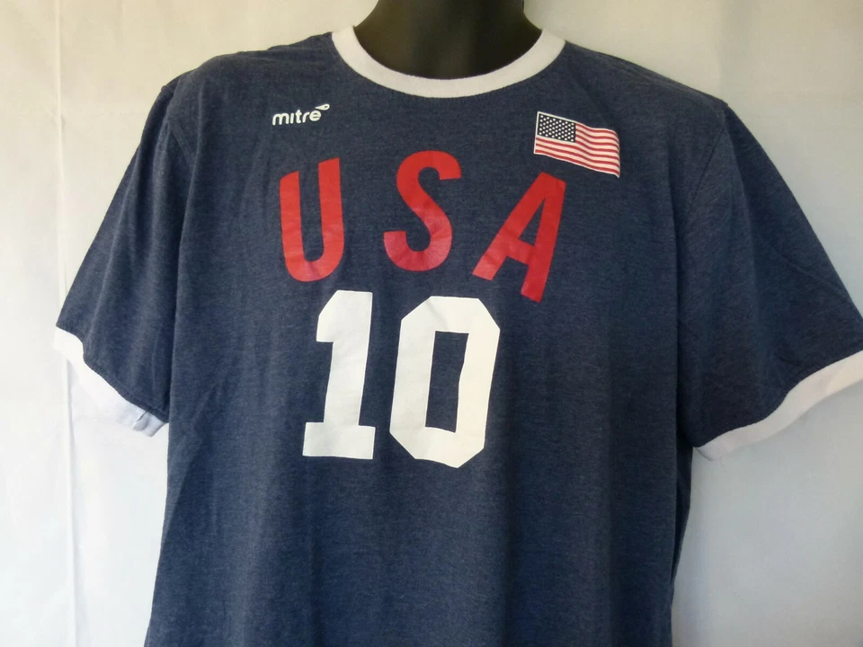 Camiseta de fútbol Mitre Elite para hombre mezcla de algodón cuello redondo firma EE. UU. 10 azul Foto 3 de 4