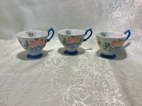 THREE VINTAGE HANDCRAFTED FOOTED PORCELAIN TEA CUPS VERY DECORATIVE