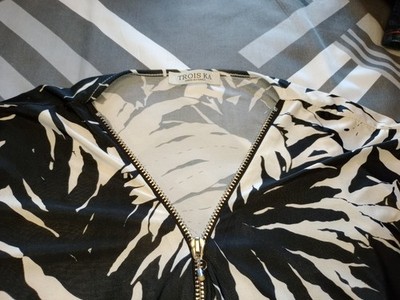 Troiska Damen Fledermaus 1/4 Reißverschluss Top schwarz-weiß Blumenmuster V-Ausschnitt 